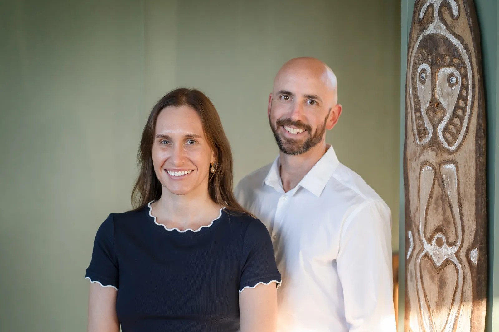 Two Frey Health Group clinicians standing together in a warm workspace
